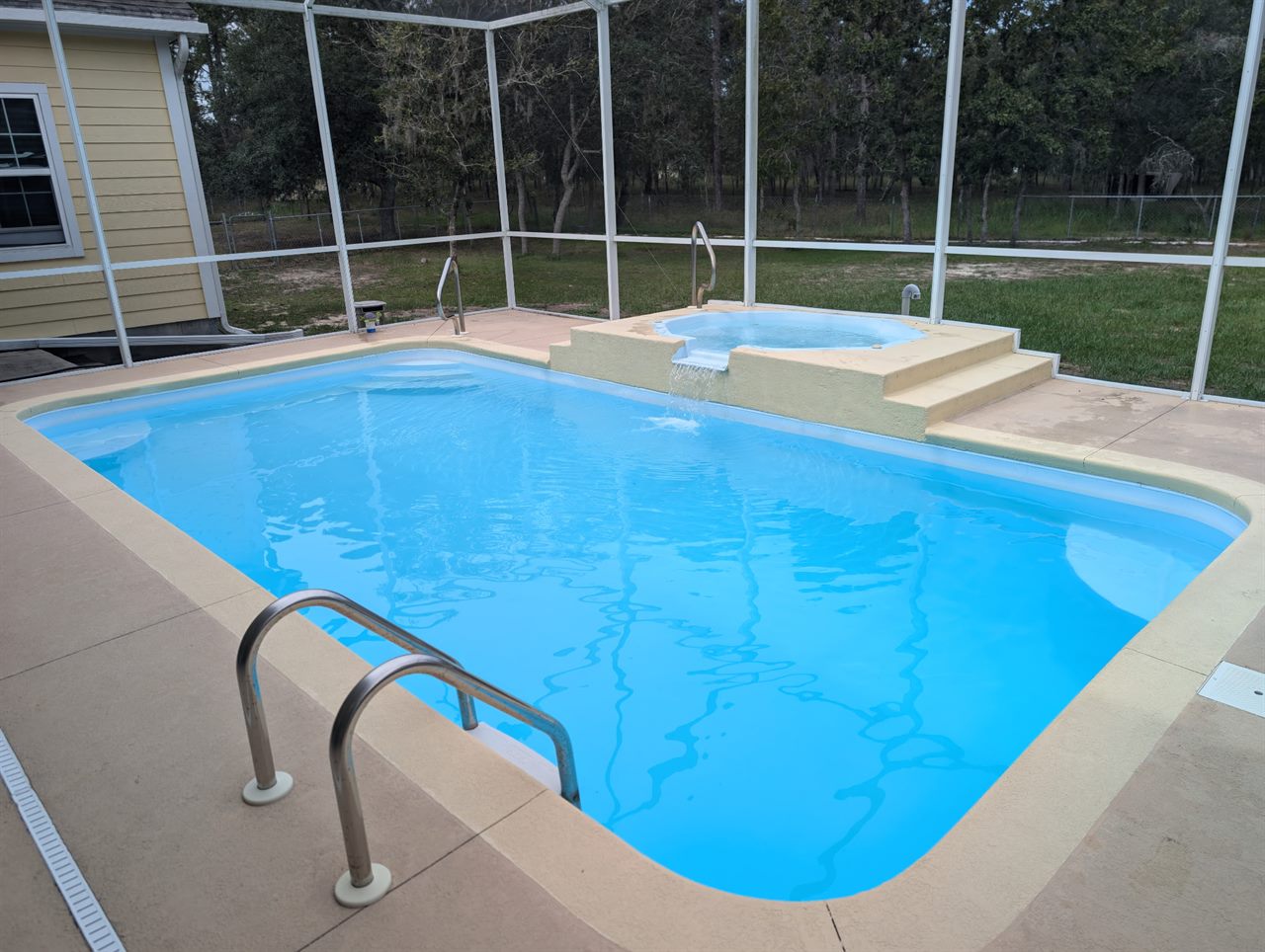 Same spa pool after — crystal-clear blue water