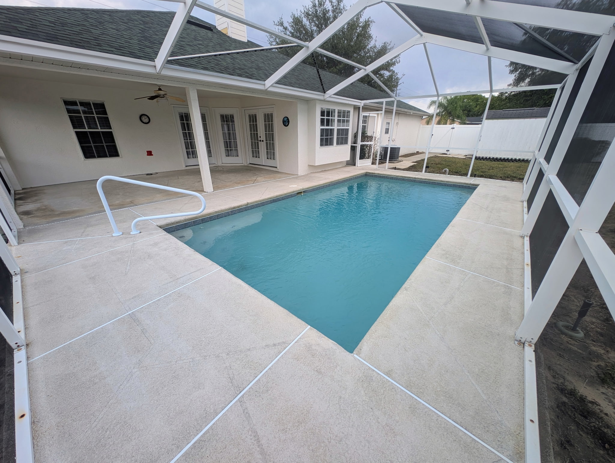 Clean screen-enclosed pool in Spring Hill, Florida